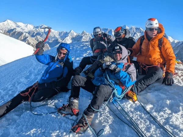 Climbers are on the top of lobuche peak