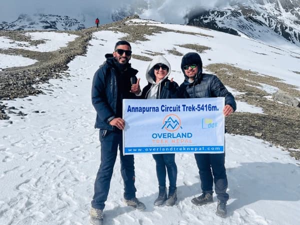 Trekkers on the top of Throngla during Budget Trek Packages in Nepal