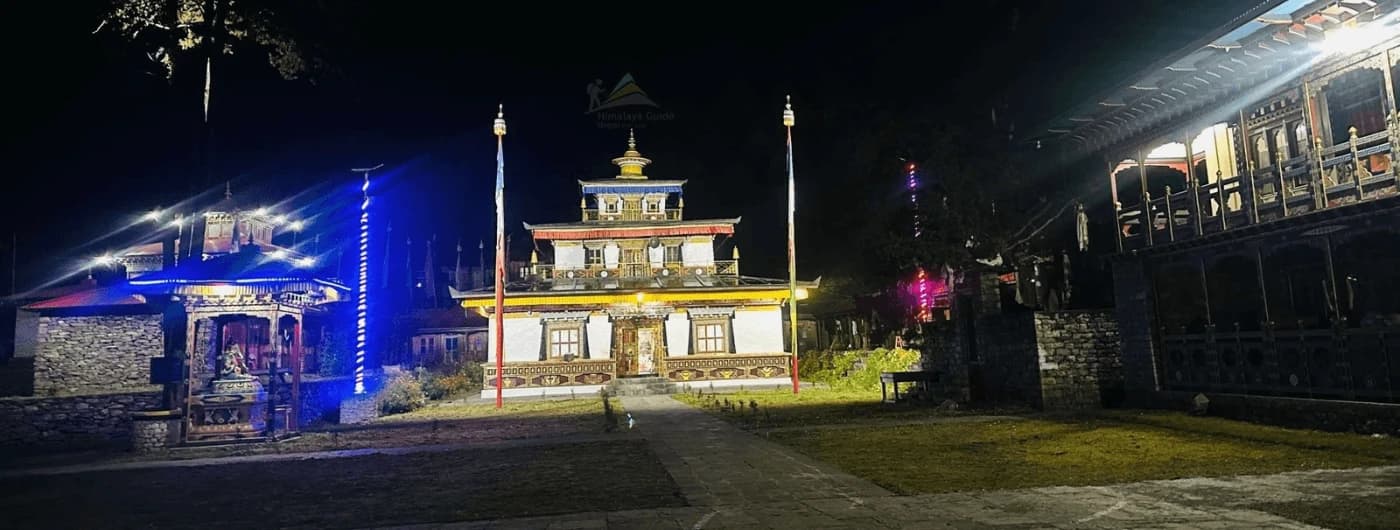 Serang Gompa at night with traditional Buddhist architecture and illuminated prayer flags in Manaslu, Nepal