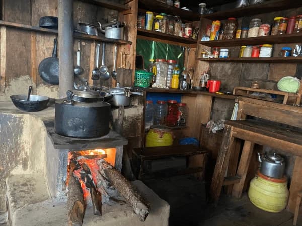 Boiling water in kitchen tamang heritage