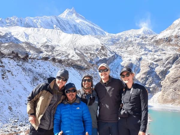 Group picture with baground manaslu