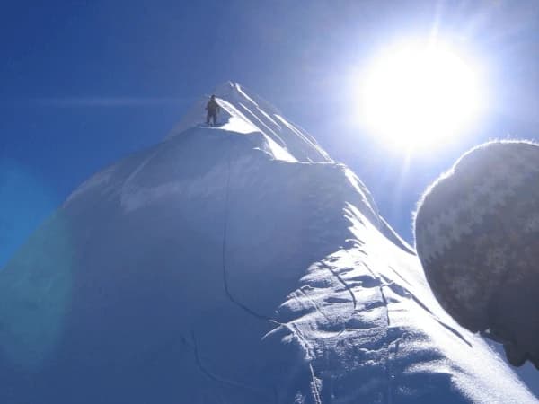 Climbers on the top of Island Peak during climbing