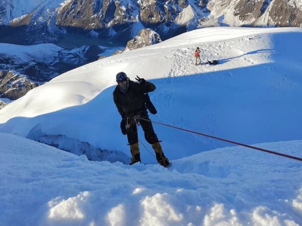 Hanging On Rope While Climbing Lobuche