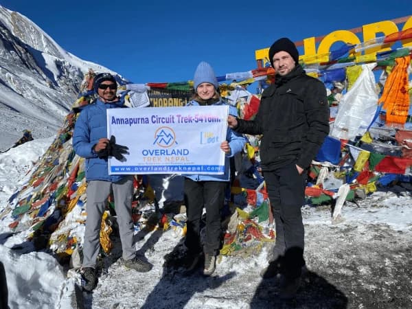 Travelers On The Top Of Thorongla Peak