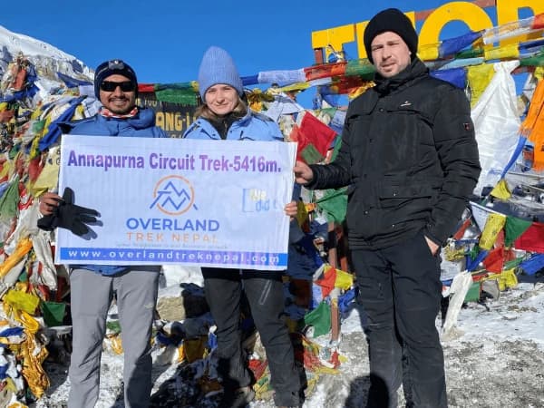 Trekkers On The Top Of Throngla