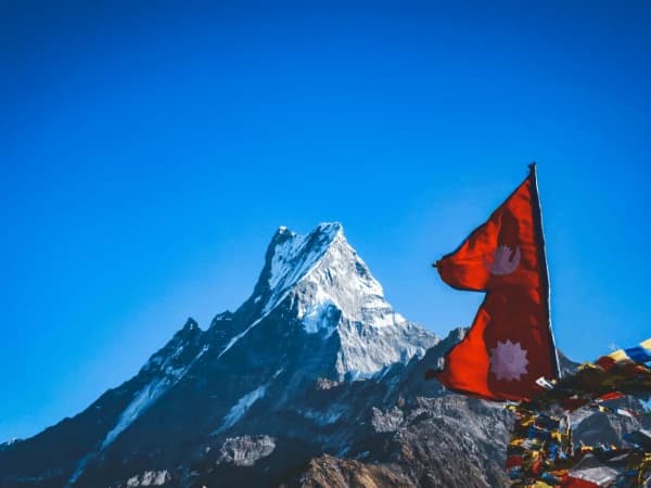 Machhapuchhre Himal with Nepali Flag view during mardi himal trek